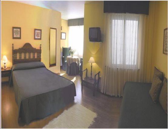 אוחדו Hostal Toscana חדר תמונה