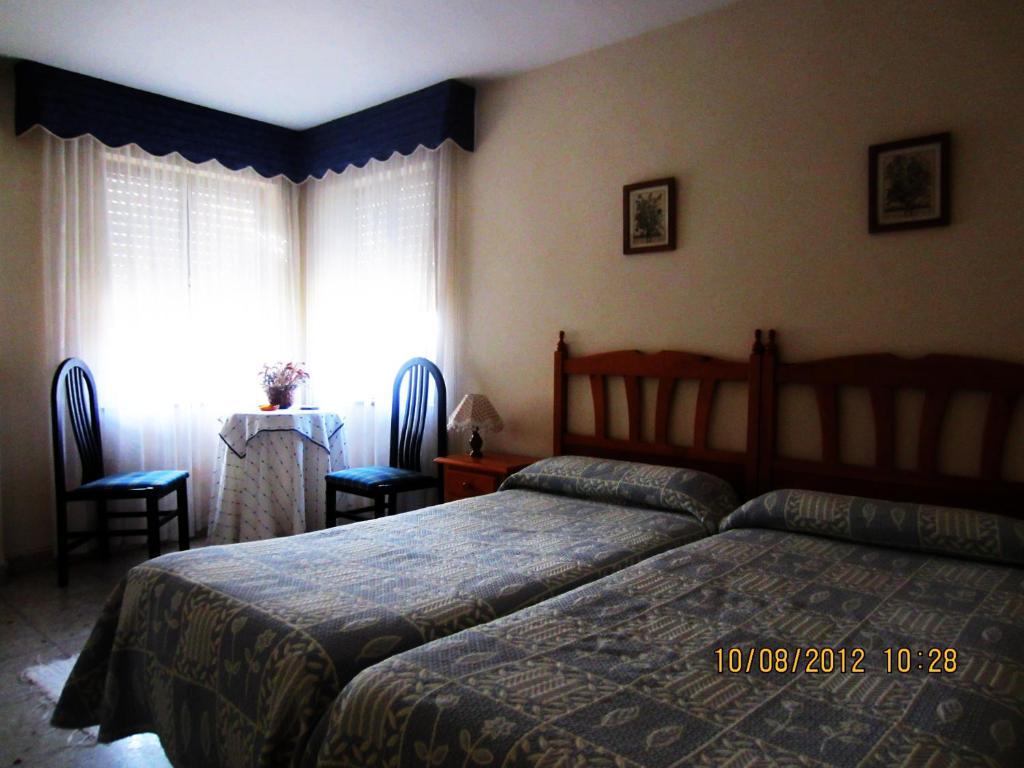 אוחדו Hostal Toscana חדר תמונה